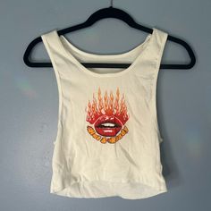 Retro Style. Im Forgetting What Brand It Is But It’s A Name Brand. Never Been Worn. Best For S/M. Y2k Red Crop Top For Summer, Red Y2k Crop Top For Summer, White Sleeveless Crop Top For Streetwear, Red Graphic Print Tank Top For Summer, Retro Red Spring Tank Top, Red Retro Spring Tank Top, Retro White Tank Top For Streetwear, Red Tank Top For Streetwear, Casual Red Tank Top With Graphic Print