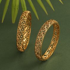 Description: Inspired by the rich tribal culture, this bangle by Tarinika is eclectic and has an earthy feel to it. It is gold plated with oxidized finish to give the definite earthy charm. Style with other jewelry from Maati Collection for a complete look. Details & Specifications: Materials used: Brass Alloy with Antique Gold Plating Weight -Bangles: 2.6- 38.5 gm Length - Bangles: 2.6- 6 cm Make it custom Want to make it a custom bangle? Sure! Reach out to us at support@tarinika.com and we’ll Gold Bangle Watch, Plain Gold Bangles, Gold Jewels Design, Gold Bangles For Women, Gold Bangle Set, Modern Gold Jewelry, Gold Chain Design, Gold Bridal Jewellery Sets, The Bangles