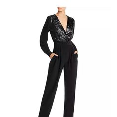 Nwt Sequin Jumpsuit Size Medium And Large Glamorous Long Sleeve Jumpsuits And Rompers For Workwear, Elegant Overall Bodysuit For Night Out, Elegant Overall Bodysuit For Party, Elegant Bodysuit Overall For Night Out, Black Long Sleeve Jumpsuits For Cocktail, Elegant Black Bodysuit With Sequins, Glamorous Floor-length Sequined Palazzo Set, Elegant Long Sleeve Sequin Bodysuit, Black Long Sleeve Cocktail Jumpsuits