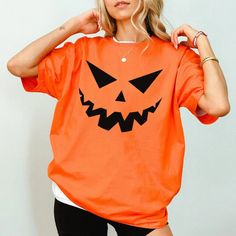 Pumpkin Face Unisex T Shirt, Stay Spooky T Shirt, Halloween T Shirt, Pumpkin T Shirt, Spooky Face T Shirt, Horror T Shirt, Halloween Night T Shirt, Party T Shirt. Spooky Orange T-shirt For Fall, Casual Orange Tops For Halloween, Spooky Orange Crew Neck Top, Orange Halloween T-shirt With Letter Print, Orange Crew Neck Top For Halloween, Funny Orange Tops For Fall, Funny Orange Top For Fall, Horror Themed Short Sleeve T-shirt For Fall, Fun Orange Short Sleeve Shirt