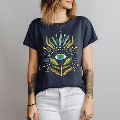 Boho Vision: Eye of Serenity Tee, boho tshirt, minimalist shirt, aesthetic shirt, floral shirt, graphic tshirt, vintage tshirt, womens Festival Graphic Print Relaxed Fit T-shirt, Casual Short Sleeve T-shirt With Unique Print, Casual Screen Print T-shirt For Festival, Festival Crew Neck T-shirt With Graphic Print, Trendy Cotton Tops With Unique Print, Festival Cotton Graphic Tee T-shirt, Festival Graphic Cotton T-shirt, Cotton Graphic Tee For Festivals, Festival Graphic Print Short Sleeve T-shirt