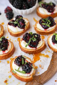 mini crostini with blueberries and cream cheese