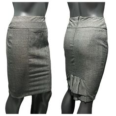 Classy And Feminine, This Pencil Style Skirt Has A Tiered Ruffle At Mid Back Hem. Zipper Back Closure. Black And Gray Woven Fabric. No Elastic At Waist As This Goes For A Smooth Look. Please See Care Tag For Fiber Content. Please See Measurements: Waist Across Flat 12.5” Hips Flat Across 17.5” Length 21” Gray Pencil Skirt Bottoms For Office, Fitted Short Gray Skirt, Fitted Gray Pencil Skirt For Office, Gray Stretch Skirt For Work, Gray Fitted Short Skirt, Fitted Gray Pencil Skirt For Work, Fitted Knee-length Gray Bottoms, Fitted Gray Knee-length Bottoms, Gray Fitted Knee-length Bottoms