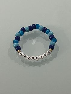 This is a Blue Pony Bead Bracelet. Add you personalization choice of letter Beads. Ex: "Aquarius"  Add your own! Blue Spiritual Bracelets With Letter Beads, Spiritual Blue Bracelets With Letter Beads, Blue Round Bead Stretch Bracelet For Birthday, Blue Round Beads Stretch Bracelet For Birthday, Blue Round Beaded Stretch Bracelet For Birthday, Personalized Turquoise Beaded Bracelets, Blue Letter Beads Stretch Bracelet For Birthday, Blue Letter Beads Friendship Bracelet For Birthday, Blue Round Beads Name Bracelet For Birthday