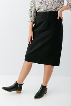 With clean, simple lines and sophisticated style, the 'Anna' is the perfect pencil skirt your closet has been waiting for. Quality fabric, full lining and structured style ensure a modest and flattering fit while an elastic waistband keeps you comfortable. Exclusively designed with you in mind! 68% Rayon 27% Nylon 5% Spandex Machine Wash Cold Gentle Cycle Hang to Dry Low Iron if Needed 1.75" Waistband Fully Lined Model A Height: 5'5" | Wearing Size Small in 23" Length Model B Height 5'8" | Weari Fitted Midi Pencil Skirt For Fall, Sleek Solid Color Skirt For Fall, Sleek Solid Color Fall Skirt, Business Casual Straight Silhouette Bottoms For Spring, Fitted Lined Pencil Skirt For Fall, Chic Midi Pencil Skirt With Lining, Chic Relaxed Pencil Skirt For Fall, Elegant Midi Pencil Skirt For Work, Classic Fitted Midi Pencil Skirt