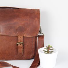 Leather satchel in vintage brown. Modern Leather Satchel With Adjustable Handle, Leather Briefcase With Adjustable Double Handle, Leather Tote Satchel With Adjustable Handle, Leather Satchel With Detachable Strap For Everyday, Brown Leather Shoulder Bag With Adjustable Handle, Leather Satchel With Adjustable Handle, Leather Satchel With Adjustable Double Handle, Leather Saddle Bag With Adjustable Handle, Leather Shoulder Briefcase With Adjustable Handle