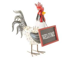 a rooster holding a welcome sign in it's beak