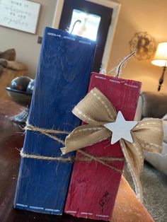 two wooden blocks tied together with twine and burlock on top of each other