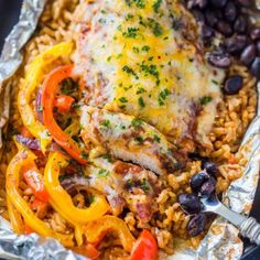 chicken enchilada in foil with black beans and lime