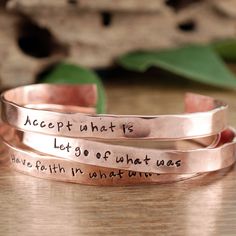 "Take a LOOK at our Website: ANNIEREH.com Inspirational Bracelet, Hand Stamped, Accept What Is, Quote Jewelry, Inspirational Jewelry, Custom Cuff Bracelet, Mantra Bracelet Customize our cuff bracelets with your favorite word/s, meaningful phrase, special saying, names of loved ones, grandchildren, dates and even coordinates for the place you met your partner or shared a special moment with someone. THIS LISTING Is for ALL 3 CUFFS: Available Metal Choices are: Aluminum(silver), Brass(gold), Coppe Jewllery Ideas, Metal Stamping Kit, Impress Art, Silver Ware, Spoon Craft, Stamp Jewelry, Jewelry Stamping, Custom Cuff Bracelet, Inspired Bracelets