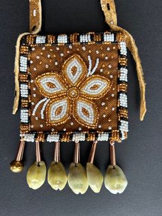 First Nations traditional medicine bag Traditional Beaded Shoulder Bag As Gift, Traditional Beaded Rectangular Pouch, Traditional Square Brown Shoulder Bag, Traditional Brown Square Shoulder Bag, Traditional Beaded Rectangular Shoulder Bag, Artisan Beaded Bag As Gift, Artisan Beaded Bags As Gifts, Traditional Beaded Bags For Daily Use, Artisan Square Shoulder Bag As A Gift