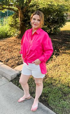 Get ready to Stand Up & Smile with this crisp collared button-down shirt in Raspberry pink! Made with 100% cotton, it features a flat pocket on the front, side slits, and endless style options. Layer it over a tank top or roll up the sleeves for a fun and versatile look. (Be prepared for compliments!) Features: Functional buttons down front. Cuffed sleeves- roll up or leave down Side slits for style and comfort Rounded hemline Fabric: 100% Cotton Brand: Double Zero Size Recommendation: S= Up to Oversized Pink Blouse With Pockets, Pink Shirt For Workwear In Summer, Pink Summer Workwear Shirt, Summer Pink Blouse With Pockets, Pink Collared Top For Day Out, Pink Collared Shirt For Day Out, Chic Pink Tops With Pockets, Pink Summer Shirt For Everyday Wear, Pink Everyday Shirt For Summer