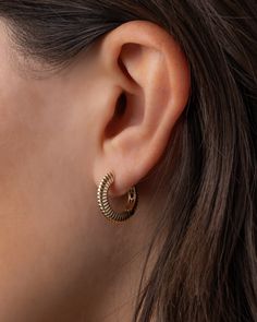 These 14k gold bubbled edge and ribbed huggie earrings are the perfect blend of elegance and attitude. Their chic design and edgy details make them effortlessly stackable for that layered, "I woke up like this" look. Slip these on and show the world that sophistication doesn't have to be boring. Note: To open the earring, press down lightly on the post. It will push down slightly and the back can be opened. Without pressing post while closed, earring will remain in "lock" mode. Outer Diameter: A Gold Bubbles, Huggie Earrings, Earring Sale, Layered Look, Personalized Necklace, Huggies Earrings, Chic Design, Ring Bracelet, Ring Earrings