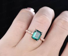 - Metal: Solid gold(10K/14K/18K white/yellow/rose gold),925 sterling silver,platinum available- Main Stone: 7x9mm emerald cut lab treated emerald- Accent Stone: natural conflict free diamonds,SI-H Clarity and Color- Can be personalized: Yes 14k Gold Emerald Cut Emerald Ring For Wedding, Emerald Ring With Rose Cut Diamonds For Formal Occasions, Art Deco Emerald Cut Emerald Ring For Promise, Art Deco Emerald Cut Emerald Promise Ring, Emerald-cut Diamond Ring For Wedding, Emerald-cut Diamond Wedding Ring, Formal Emerald Cut Emerald Ring With Rose Cut Diamonds, Formal Emerald Cut Ring With Rose Cut Diamonds, Fine Jewelry Rose Gold Emerald Ring