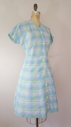 Vintage 1950s Dress / Pastel Plaid Cotton Dress / Medium Large Summer Plaid Short Sleeve Dress With Buttons, Summer Plaid Dress With Short Sleeves And Buttons, Vintage Plaid Short Sleeve Dress, Retro Short Sleeve Plaid Gingham Dress, Fitted Vintage Plaid Dress With Buttons, Vintage Plaid Dress With Buttons, 1950s Style Vintage Dress With Short Sleeves For Daywear, Fitted Plaid Dress With Short Sleeves And Buttons, Fitted Plaid Dress With Buttons And Short Sleeves