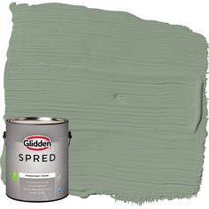 a green paint with the words, golden spred on it and an open can