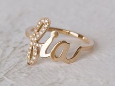 This is a unique solid gold personalized name ring, the perfect 14K/18K name ring, a stunning personalized push gift, customized name ring, diamond name ring. Fabulous 14K Gold personalized name ring, customized with your name or any word with sparkling diamonds set on the initial. This unique ring has your initial studded with multiple diamonds. Rest of the letters of your name appear in shiny script in polished gold, this unique piece makes a wonderful push present or gift for any mom, sister, Luxury Yellow Gold Diamond Ring With Initials, 14k Yellow Gold Monogram Diamond Ring, Luxury Personalized Diamond Initial Ring, Luxury Personalized 14k Gold Diamond Ring, Diamond Engraved Ring With Initials For Gift, Diamond Engraved Ring With Initials As Gift, Personalized Elegant Diamond Ring For Gift, Personalized Elegant Diamond Ring Gift, Elegant Personalized Diamond Ring For Gift