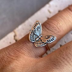 This dainty butterfly ring, made from high-quality 925 sterling silver, is perfect for any occasion. Its adjustable band ensures a comfortable fit, and the elegant butterfly design symbolizes beauty and transformation. A thoughtful gift or a charming addition to your own collection, it comes ready to gift. Silver Butterfly Ring, Dainty Butterfly, Butterfly Ring, Silver Butterfly, Butterfly Design, Dainty Jewelry, Ring For Women, Rings Statement, Nature Inspired