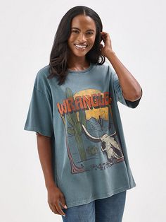 On casual days, our Women’s Wrangler Retro® Western Graphic Tee will add some Western authenticity to your look. This classic crewneck tee is crafted from cotton for an airy feel and comfort from sunup to sundown. It comes with an oversized fit that helps it feel broken-in from the start. Wrangler Women, Western Graphic Tees, Retro Western, Oversized Tee, Women's Tops, Womens Tees, Graphic Tees, Womens Tops, Crew Neck