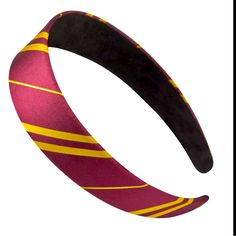 a purple and yellow striped headband on a white background