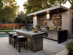 an outdoor bar with stools next to it and a pool in the back ground