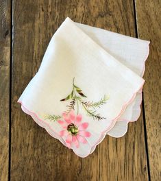 "This handkerchief features lovely raised floral detail with pretty colors. It is in very good vintage condition with one flower petal end fraying a bit...price reflects this. Use it for a personal accessory, at your celebration, for crafts or hang it as it is that pretty. I use handkerchiefs as doilies too. Very charming... Approximate overall measurements: 10.5\" square Please zoom on photos for a closer view. Check out our other vintage hankies: https://www.etsy.com/shop/TwoBeContinued?ref=se Vintage Pink Handkerchiefs For Wedding, Vintage Pink Wedding Handkerchiefs, Vintage Pink Floral Embroidered Handkerchiefs, Pink Vintage Handkerchiefs With Floral Embroidery, Pink Flower Shaped Handkerchiefs For Gifts, Flower Shaped Pink Handkerchiefs For Gifts, Vintage Pink Flower-shaped Handkerchief, Pink Flower-shaped Handkerchief For Gift, Pink Vintage Flower-shaped Handkerchief