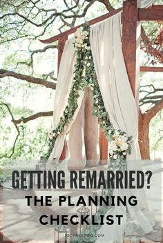 a wedding arch with the words getting married? the planning checklist