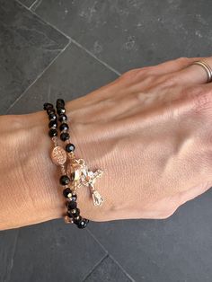 Daily rosary bracelet! This lightweight rosary bracelet with acryclic black beads. Spiritual Resizable Rosary Bracelet Gift, Elegant Black Rosary Bracelet For Gift, Elegant Hand-strung Rosary Bracelet For Healing, Hand-strung Black Rosary Bracelet With Round Beads, Catholic Bracelet, Saints Medals