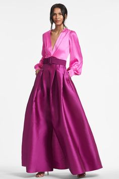 Shop the Lydia Skirt in Magenta Bloom at Sachin & Babi. FREE Shipping Over $500 & FREE Returns. Elegant Gown With Full Satin Skirt, V-neck Satin Finish Gown For Gala, Satin Finish V-neck Gown For Gala, Satin Gown With Full Skirt For Gala, Elegant Pink Dress With Voluminous Skirt, Silk V-neck Gown For Formal Occasions, Pink Satin Gown With Pleated Bodice, Silk Pleated Gown For Gala, Formal Silk Evening Dress With Full Skirt