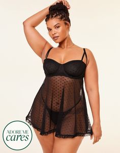 Our plus-size babydoll in jet black features sheer dot mesh with cut-out and elastic detail at the cups. This ruffle-trimmed piece has a full skirt, back hook & eye closure with a keyhole cutout—it also comes with a matching g-string panty. (Available in plus-sizes XL-4X.) Plus Size Lingerie Outfit Night, Halloween Lingerie, Chic Bra, Lingerie Plus, Lingerie Plus Size, Adore Me, Babydoll Lingerie, Costume Shop, Bra And Panty Sets