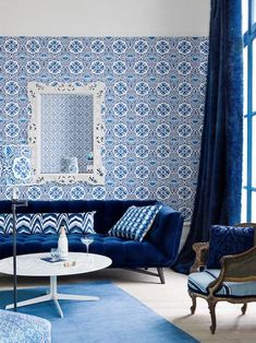 a living room with blue and white decor