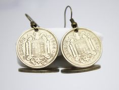 Check out our coin earring selection for the very best in unique or custom, handmade pieces from our earrings shops. Vintage Silver Coin Earrings, Coin Pendant Earrings As Gift, Coin Pendant Earrings For Gifts, Vintage Coin Pendant Earrings Gift, Vintage Coin Pendant Earrings For Gift, Engraved Coin Earrings For Gift, Vintage Earrings With Coin Pendant For Gift, Vintage Silver Earrings With Coin Pendant, Handmade Vintage Coin Earrings