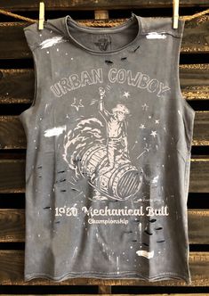 Country Deep Urban Cowboy distressed acid wash with splatter detail muscle tank top available in faded black Cheap Acid Wash Distressed T-shirt, Distressed Fashion, Mechanical Bull, Urban Cowboy, Muscle Tank Top, Muscle Tank Tops, Cool Hats, Muscle Tank, Muscle Tanks