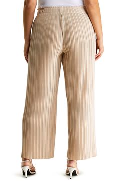 Plissé pleats add to the flowiness of these wide-leg crepe pants that will keep you comfortable all day. 29" inseam; 24" leg opening; 13 1/4" front rise; 18 1/2" back rise 100% polyester Unlined Hand wash, line dry Imported Wide Leg Pants With Accordion Pleats, Beige Pleated Wide Leg Bottoms, Beige Pleated Full-length Bottoms, Beige Bottoms With Accordion Pleats For Spring, Beige Accordion Pleated Bottoms For Spring, Summer Wide Leg Bottoms With Accordion Pleats, Wide Leg Bottoms With Accordion Pleats For Summer, Accordion Pleated Wide Leg Bottoms For Summer, Accordion Pleats Wide Leg Summer Bottoms