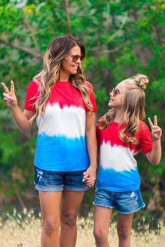 WE RECOMMEND SIZING ONE SIZE DOWN IN MOM SIZES! *Each top sold separately* Mom & kid tops feature short sleeves perfect for warm weather wear Short sleeve shirts feature an allover red, white and blue ombré print Ultra soft material for comfort & ease all season long Twinning is winning! Match with your little ones in our Patriotic Firecracker Ombre Tops. These tops feature short sleeves and a fun red, white, and blue ombré color block print. In a versatile design, this top is made from soft and 2nd Birthday Shirt, Sparkle In Pink, Ombre Top, Family Tees, Birthday Party Shirt, Tie Dye Shirts, Weather Wear, Short Sleeve Shirts, Ombre Color