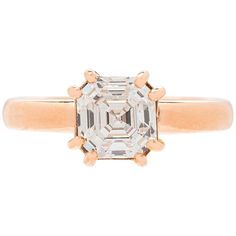 An original modern yet timeless design showcasing an exceptional diamond. This 1.68 carat Asscher Square emerald cut diamond is set in an 18 karat rose gold mounting with split double prongs. The diamond boasts Internally Flawless clarity and G color, accompanied by GIA report #13379320. Currently a size 6.5, the ring can easily be resized to fit almost any finger. A design fit for a bride who wants to stand out in a crowd, but still appreciates fine quality and craftsmanship. Timeless Octagon Rose Cut Diamond Ring, Luxury Solitaire Baguette Cut Ring, Timeless Solitaire Octagon Ring, Timeless Octagon Solitaire Ring, Luxury Octagon Diamond Ring With Single Cut Diamonds, Luxury Princess Cut Diamond Ring With Rose Cut Diamonds, Timeless Asscher Cut Diamond Ring With Single Diamond, Luxury Princess Cut Rose Diamond Ring, Timeless Asscher Cut Single Diamond Ring