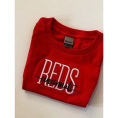 Cheer on your favorite baseball team with this super cute Cincinnati Reds crewneck.  3 sweatshirt and thread colors available:  red - black - white **please specify which thread color combination you would like in the personalization box** Sweatshirt is a heavyweight blend of 50/50 polyester/cotton. All items are made to order. Please allow 1-2 weeks for production and shipping. Embroidered Team Sweatshirt, Red Crew Neck T-shirt With Embroidered Logo, Red Sporty Crew Neck T-shirt, Red T-shirt With Embroidered Logo For Streetwear, College Red Tops With Embroidered Text, Red College Tops With Embroidered Text, Red College Top With Embroidered Text, Red Embroidered Text College Tops, Red College Sweatshirt With Embroidered Logo