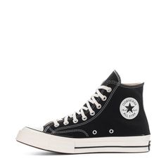 By 1970, the Chuck Taylor All Star evolved into one of the best basketball sneakers ever. The Converse Chuck 70 celebrates that heritage by combining archival-inspired details with modern comfort updates. Ortholite insole cushioning and winged tongue stitching take the comfort level up a notch. A glossy midsole and signature star ankle patch bring out the shoe's iconic, vintage style. Runs a half-size large. High-top shoe with canvas upper. Winged tongue stitching helps lock it in place. Vintage Converse Chuck Taylor 70, Chuck Taylor 70, White Kicks, Converse Chuck 70, Wide Width Shoes, Chuck 70, Basketball Sneakers, Backpack Sport, Chuck Taylor All Star