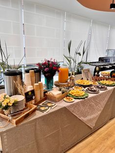 the buffet table is set up with food and drinks