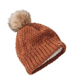 Ultra-cozy hi-pile fleece lines this fun popcorn-stitch hat for warmth and comfort all winter long. Lined in ultrasoft 100% polyester hi-pile fleece. Made of warm 100% recycled polyester. Fun faux-fur pom. Imported. | Women's Wicked Cozy Knit Pom Hat, Synthetic Fun Popcorn, Stitch Hat, Popcorn Stitch, Cozy Hat, Women's Headwear, Winter Hats Beanie, Cozy Knit, Pom Pom Hat, Fur Pom Pom