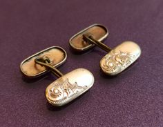 1950 Gold Filled Cufflinks, Flowers Cufflinks, Collectible Cufflinks, Gold Filled Cuff Links, Antique Cuff Links, Handmade Cufflinks Cufflinks from the 1950s, specifically the "1950 Gold Filled Cufflinks," represent a classic and enduring accessory that exudes elegance and style. These distinguished cufflinks, hailing from the 1950s, are a testament to the timeless allure of vintage accessories. Crafted from gold-filled materials, they bear the mark of an era when sophistication and attention to Vintage Engraved Jewelry For Business, Antique Engraved Cufflinks For Wedding, Antique Engraved Cufflinks For Anniversary, Vintage Engraved Cufflinks For Anniversary, Cufflinks Men Classic Vintage, Luxury Vintage Yellow Gold Cufflinks, Vintage Rectangular Cufflinks For Gifts, Gold Vintage Cufflinks With Polished Finish, Vintage Screw Back Cufflinks As Gift