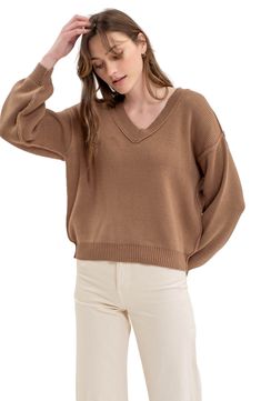 A V-neckline frames the slouchy silhouette of this cotton-blend knit sweater that'll make a great layer when the weather is chilly. 22 1/5" length (size Small) V-neck Long sleeves with ribbed cuffs 60% cotton, 40% acrylic Hand wash, dry flat Imported Casual Brown Knit V-neck Sweater, Casual Brown V-neck Sweater For Layering, Cozy Brown Knit V-neck Sweater, Beige V-neck Cropped Sweater For Fall, Oversized V-neck Sweater For Everyday Fall Wear, Fall Beige V-neck Cropped Sweater, Beige Cotton V-neck Sweater, Trendy Cotton V-neck Sweater For Fall, Brown Long Sleeve V-neck Sweater For Spring