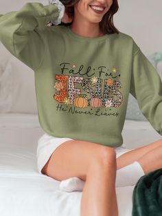 ❤ ❤ ❤  Get cozy this Christmas with our festive sweatshirts. Made from a premium blend of 50% cotton and 50% polyester, these holiday essentials offer unmatched softness, warmth, and durability. With air-jet spun yarn for a gentle feel and a quarter-turned design to keep it crease-free, you'll look as great as you feel. Perfect for all your holiday gatherings, our sweatshirts combine comfort with quality stitching for lasting wear. Celebrate in style with a sweatshirt that's ready for the season Fall For Jesus, Jesus Sweatshirts, Holiday Essentials, Sweat Shirts, Holiday Gathering, Look Plus, Getting Cozy, White Ink, Sweatshirt Fashion