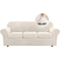 a white couch with the words velvet on it