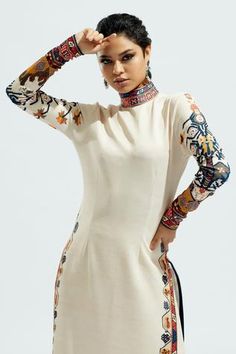 Shop for Rajdeep Ranawat Beige Lycra Nora High Neck Tunic for Women Online at Aza Fashions Elegant Fitted Tops With Printed Motifs, Fitted Tops With Printed Motifs, Elegant Fitted Printed Kurta, Fitted Floral Print Tunic, Elegant Fitted Kurta With Digital Print, Elegant Digital Print Kurta, Fitted Long Sleeve Kurta With Digital Print, Fitted Long Sleeve Printed Tunic, Fitted Long Sleeve Tunic With Floral Print