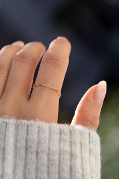 Bare chain ring in 14k Solid Gold Modern and timeless Super Dainty Link Chain Ring Perfect as a stacking ring or by itself. This listing is for one dainty chain ring, for other rings you can find them here: * You can find the sparkle diamond cut stacking Ring here: https://www.etsy.com/listing/762641778/dainty-stacking-rings-in-14k-solid-gold?click_key=0892af659420ebc0b6207afa3d914869aed2dc75%3A762641778&click_sum=75260ec2&ref=shop_home_active_14&frs=1 * Flat bar chain ring here: https://www.ets Elegant 14k Gold Cable Chain Ring, 14k Gold Link Chain Ring, Classic Link Chain Ring For Everyday, Elegant Chain Ring As Gift, Minimalist Gold Chain Jewelry For Anniversary, Classic Oval Link Chain Ring For Everyday, Classic Rings With Gold Chain For Gift, Classic Gold Chain Rings As Gifts, Minimalist 14k Gold Link Chain Ring