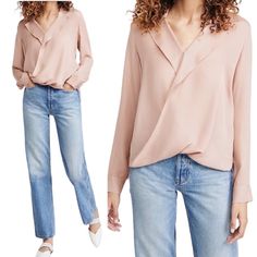 a woman wearing jeans and a pink blouse with an asymmetrical twist on the front