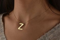 This personalized initial necklace is 14k Solid GOLD ( not filled or plated).  Personalized solid gold necklace in 14k Gold, Rose Gold, White Gold.  You can customize this 14k solid gold necklace with a letter of your choice.  #personalizednecklace #VivaRing #14kgoldnecklace #personalizedchoker #customnecklace #PersonalizedJewelry #personalizedgift #namenecklace #initialnecklace  #lovegifts #personalizedpendant #birthdaygiftromantic #romanticgifts #giftsforbestfriend Elegant Gold Initial Necklace With Name Detail, Gold Polished 14k Gold Initial Necklace, Gift Initial Pendant Necklace With Polished Finish, Modern Gold Initial Necklace For Anniversary, Classic Initial Necklace With Polished Finish Gift, Polished Initial Pendant Necklace For Gift, Classic Polished Initial Necklace For Gift, Modern Initial Pendant Necklace As Gift, Gold Initial Necklace For Anniversary With Polished Finish