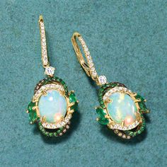 Ross-Simons - Opal Drop Earrings, .64ct t. w. Multicolored Diamonds, .70ct t. w. Multi-Gemstones. Our dreamy drop earrings call to mind the kind of lush greenery found in nature's most enchanting hideaways. Featuring 8x10mm oval opal cabochons that are encircled by artful borders of .64 ct. t. w. brown and white diamonds and .20 ct. t. w. tsavorite rounds with fanciful marquise emeralds that total .50 carats. Set in polished 14kt yellow gold. Hanging length is 1 3/8". Black rhodium at brown diam Multi-stone White Gold Earrings For Formal Occasions, Formal Multi-stone Round Earrings, Formal Multi-stone Fine Jewelry Earrings, Luxury Multi-stone Earrings, Elegant Multi-stone Round Earrings, Elegant Multi-stone Diamond Earrings For Anniversary, Fine Jewelry Multi-stone Round Diamond Earrings, Formal Multi-stone Cubic Zirconia Earrings, White Diamond Multi-stone Earrings