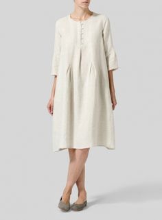 Linen Embroidered Hemline Dress Elegant A-line Dress With Relaxed Fit, Spring Relaxed Fit Dresses, Relaxed Fit Spring Dresses For Casual Wear, Elegant Tunic For Summer Day Out, Elegant Summer Tunic For Day Out, Beige Dresses For Daywear, Spring Tunic Midi Dress With Relaxed Fit, Elegant Shirt Dress With Relaxed Fit For Spring, Spring Neutral Linen Dress